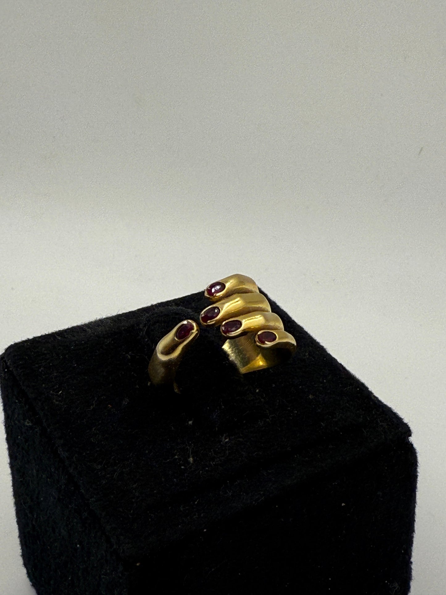 Vintage Style Gold Hand Ring with Ruby Accents